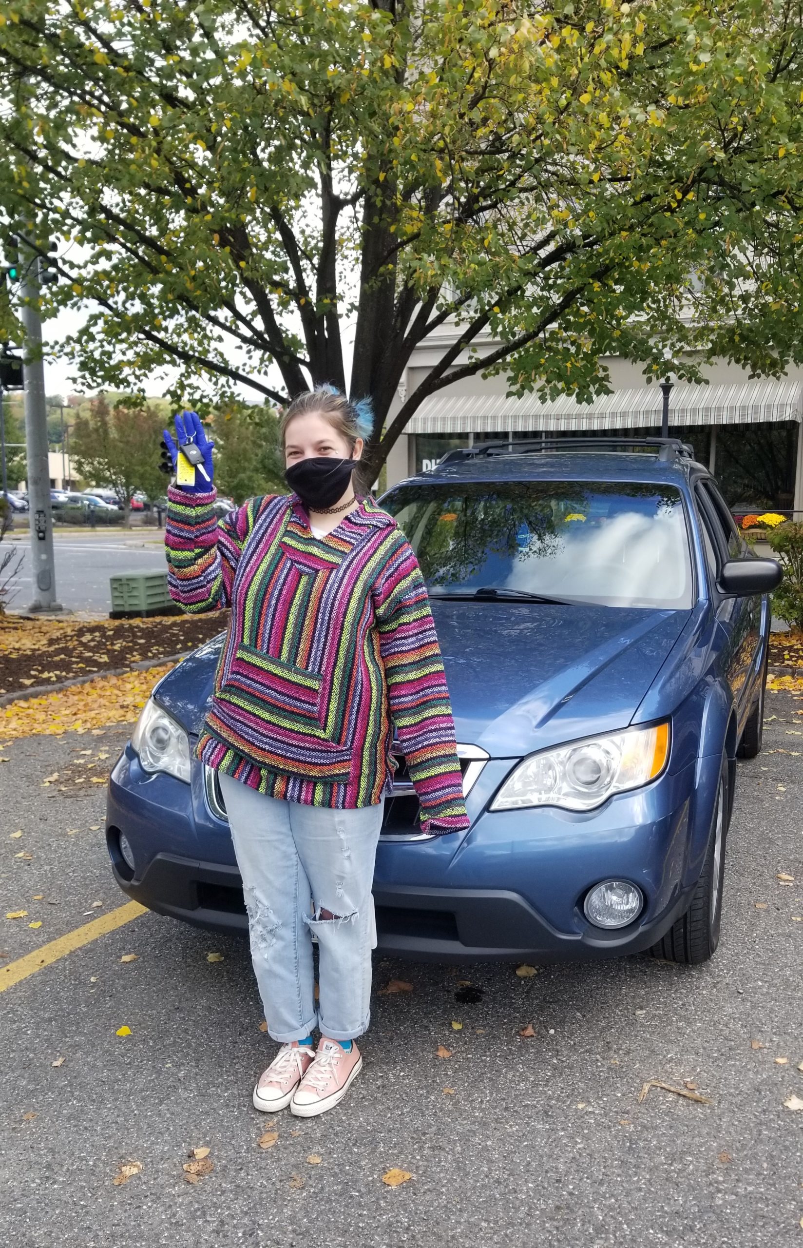 GNG client Alexandra DiCarlo poses with the Subaru she was awarded in October 2020.