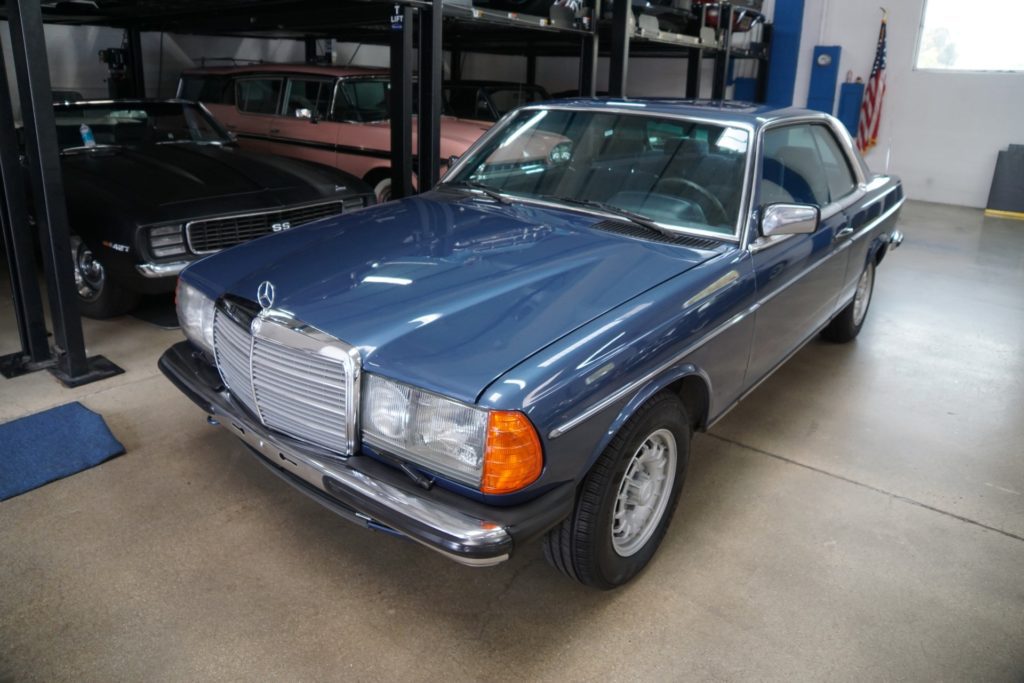 A classic Mercedes Benx CE230 in storage