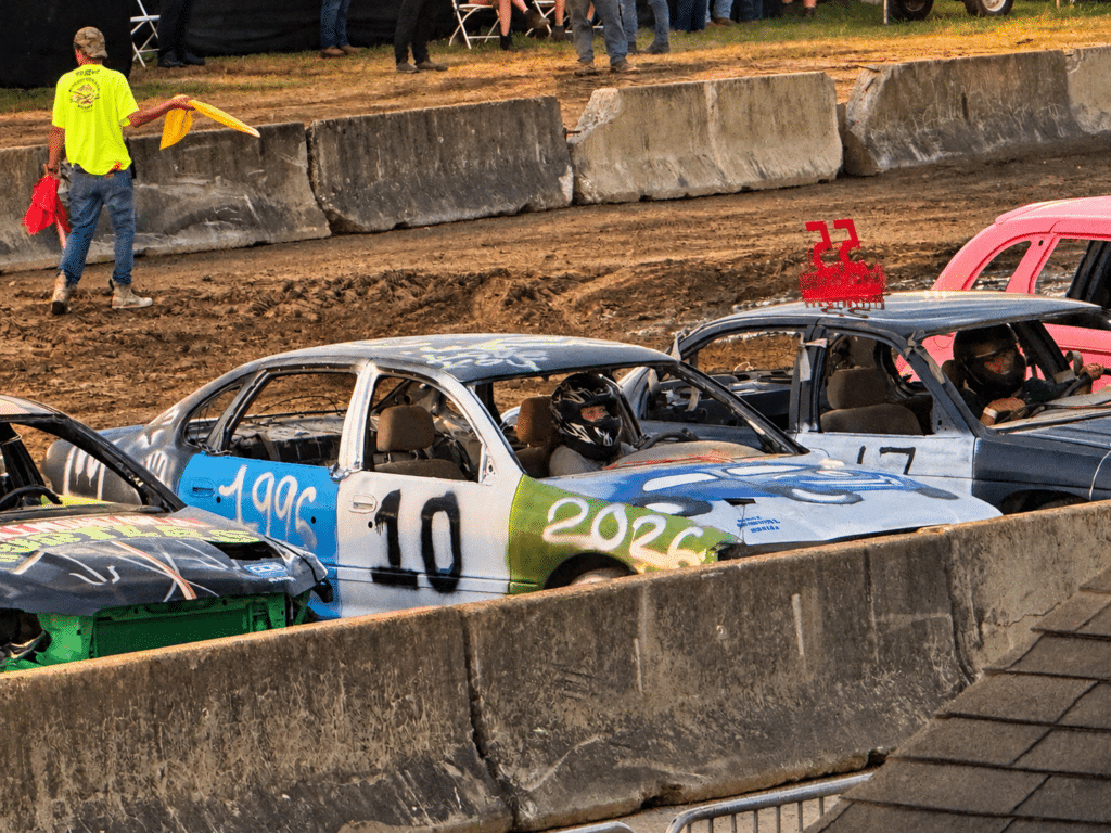 Car #10, a donated car turned into a demolition derby car by the staff at Good News Garage lines up for the start of round 1.